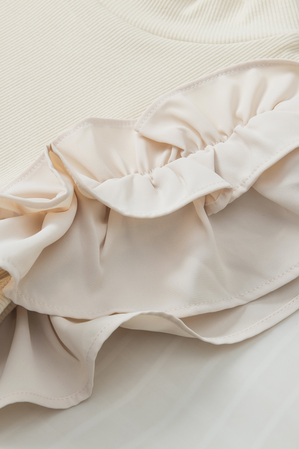 Beige Ruffle Flutter Sleeve High Neck Ribbed Blouse