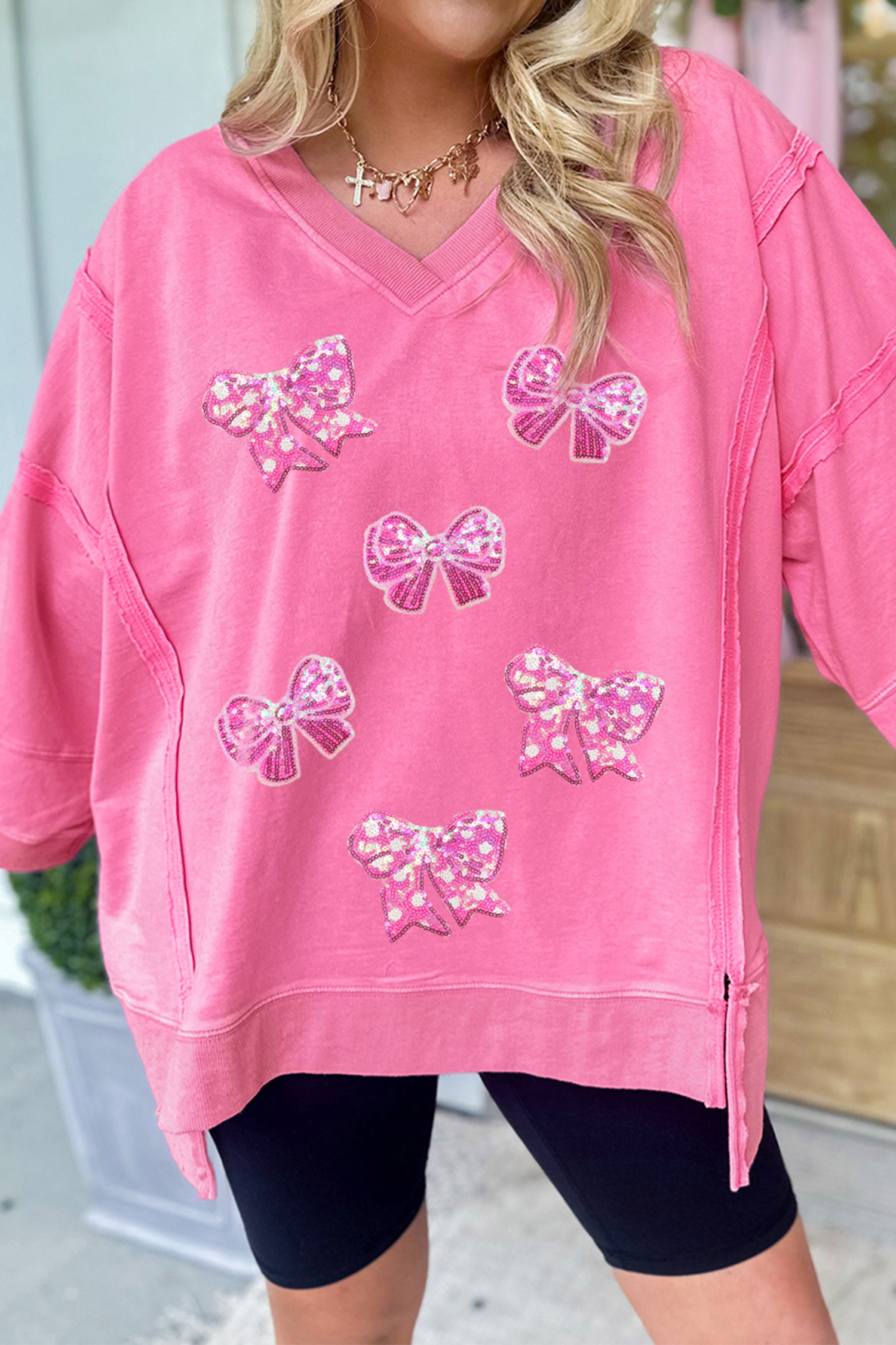 Bonbon Sequined Bow Patched Exposed Seam Bracelet Sleeve High Low T Shirt