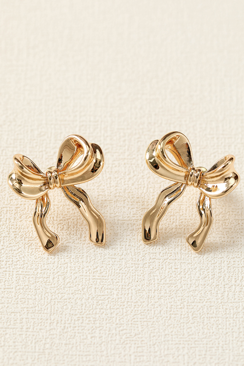 Gold Elegant Bow Design Plated Studded Earrings