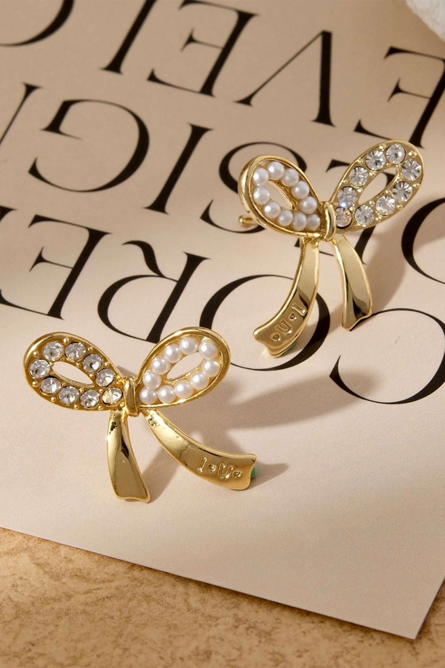 Gold Rhinestone Pearl Bow Earrings