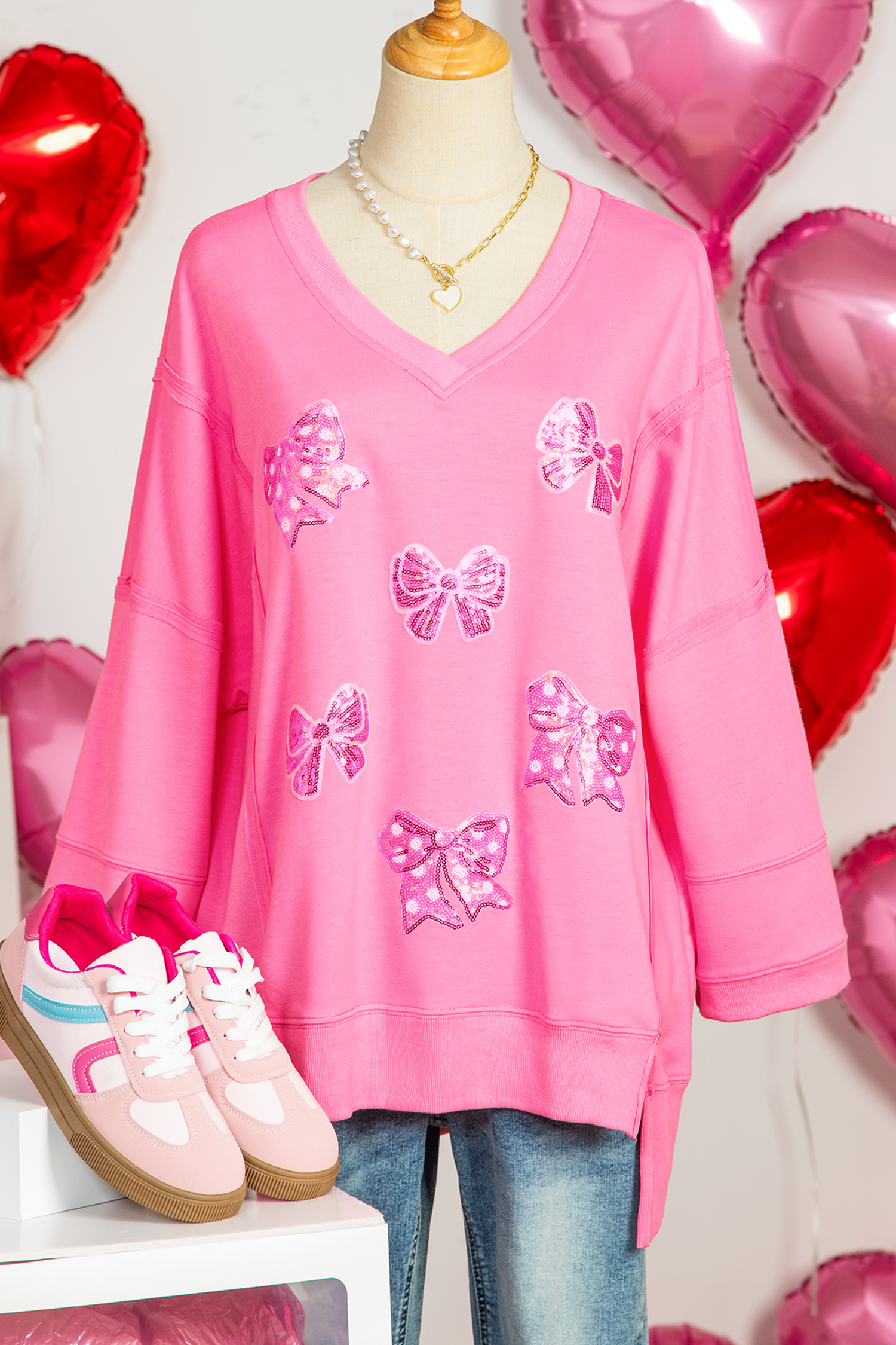 Bonbon Sequined Bow Patched Exposed Seam Bracelet Sleeve High Low T Shirt