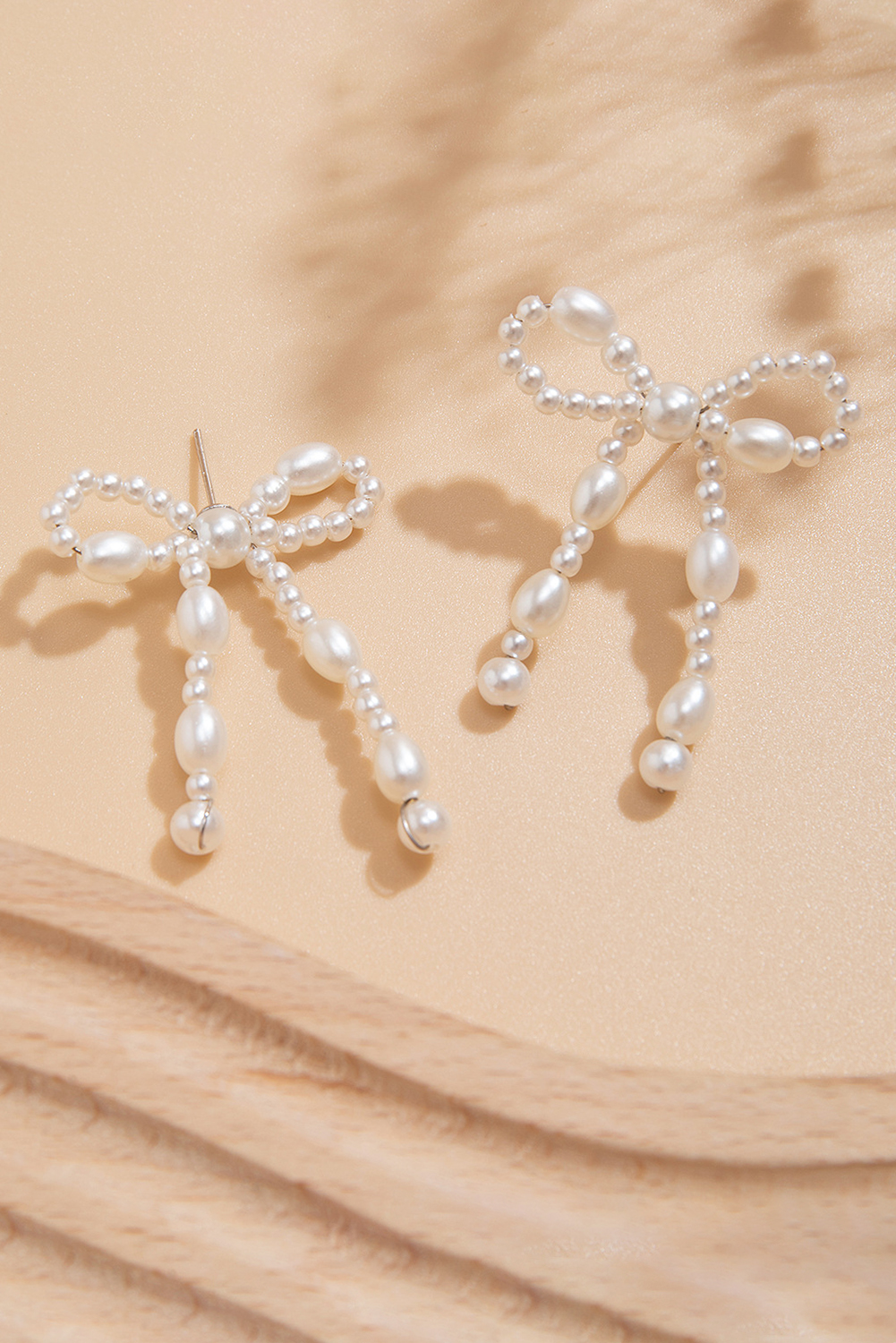 Gold Elegant Bow Design Plated Studded Earrings