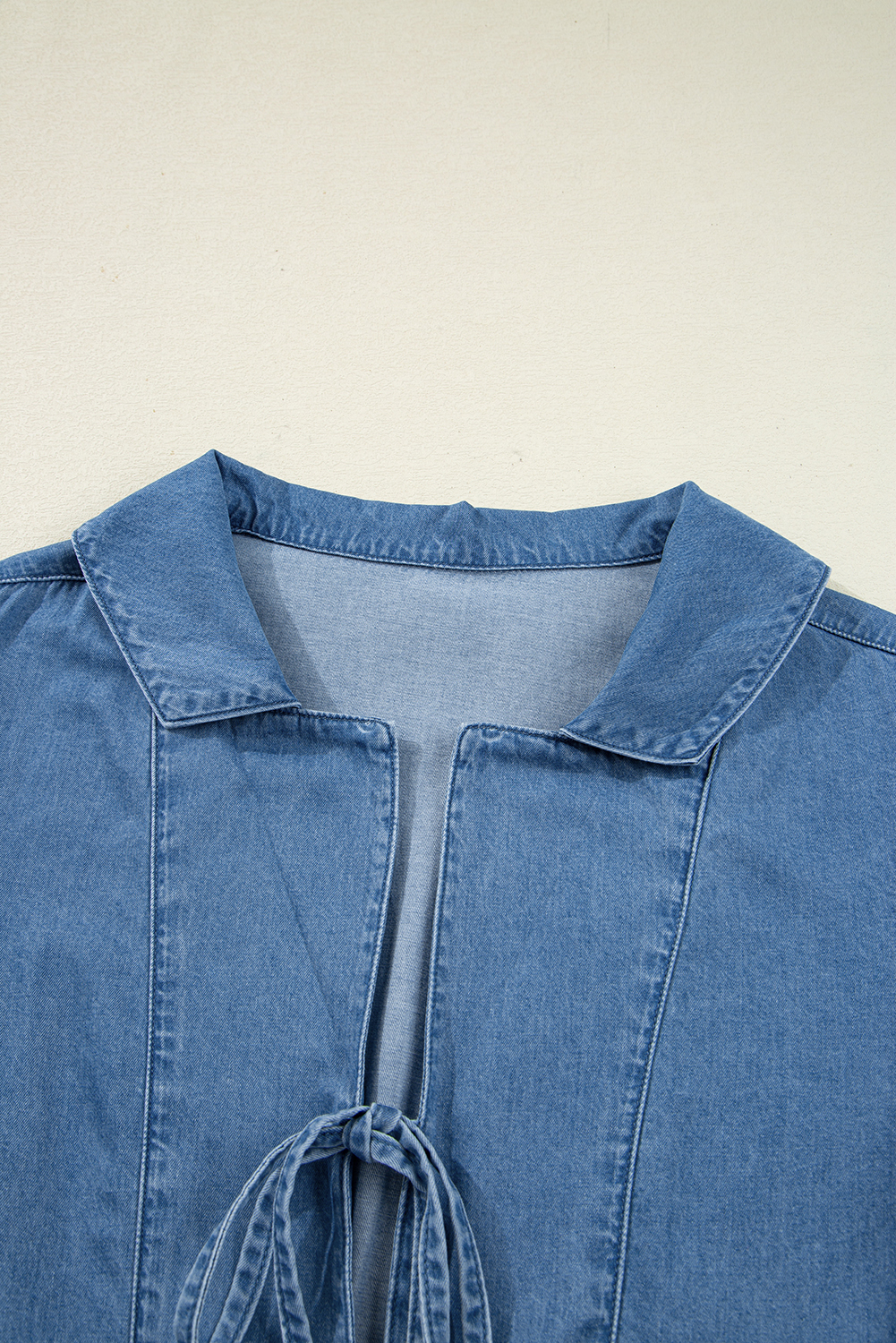 Dusk Blue Denim Lapel Neck Balloon Sleeve Tied Peplum Top