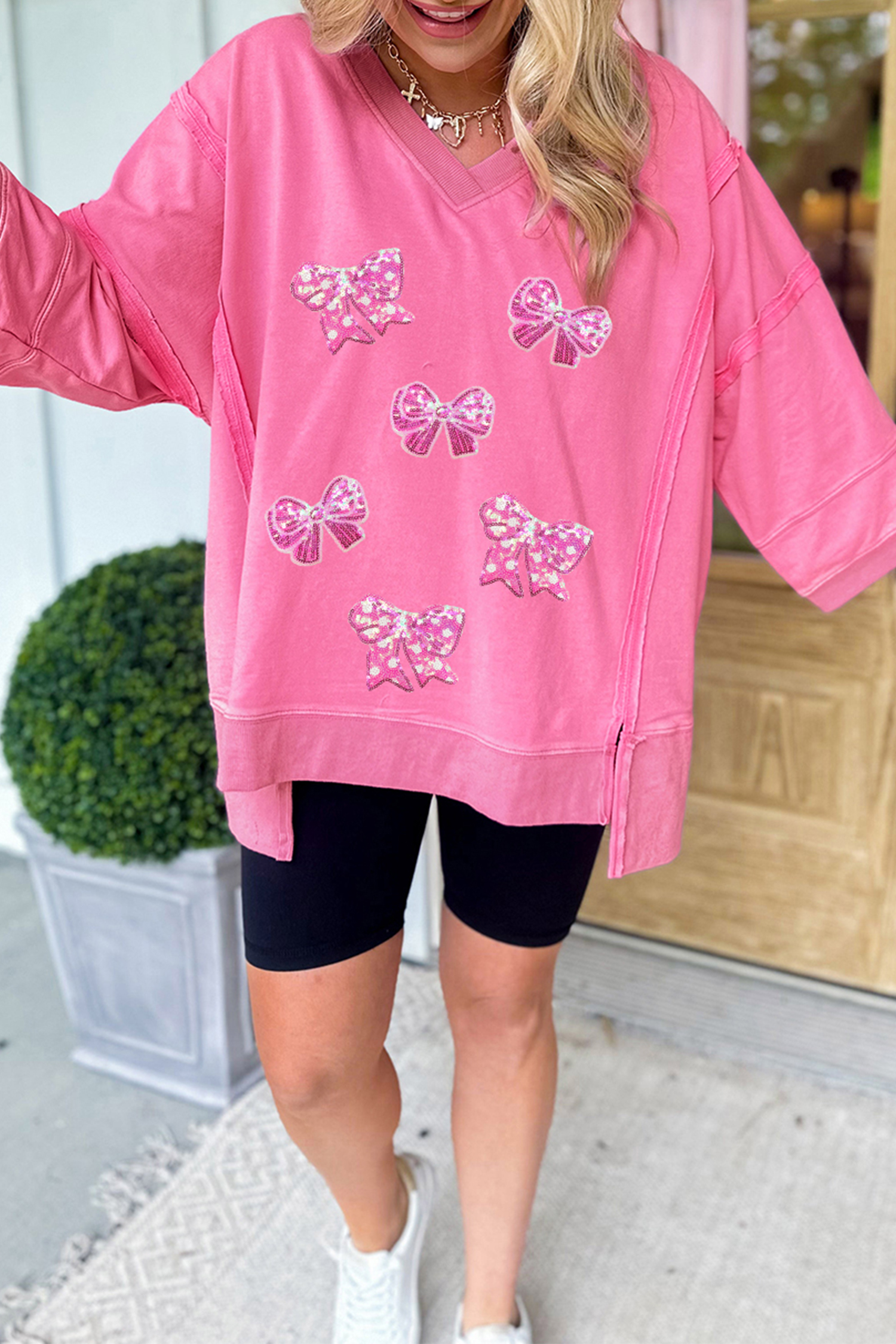 Bonbon Sequined Bow Patched Exposed Seam Bracelet Sleeve High Low T Shirt
