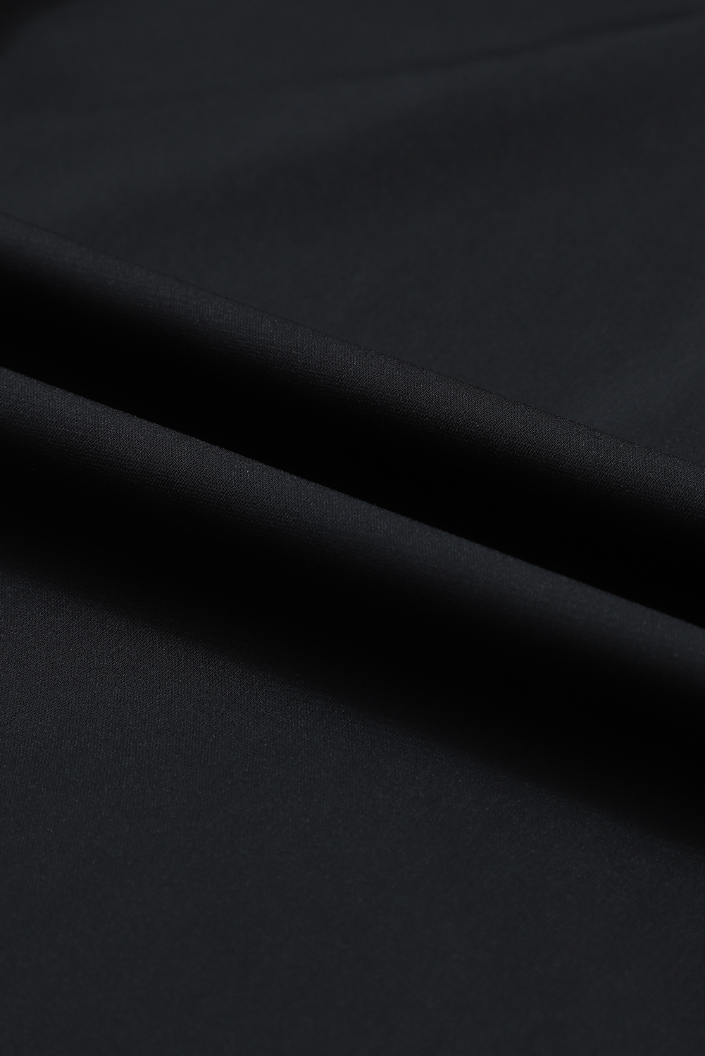 Black Solid Surplice Neck Shirred Cuffs Draped Blouse
