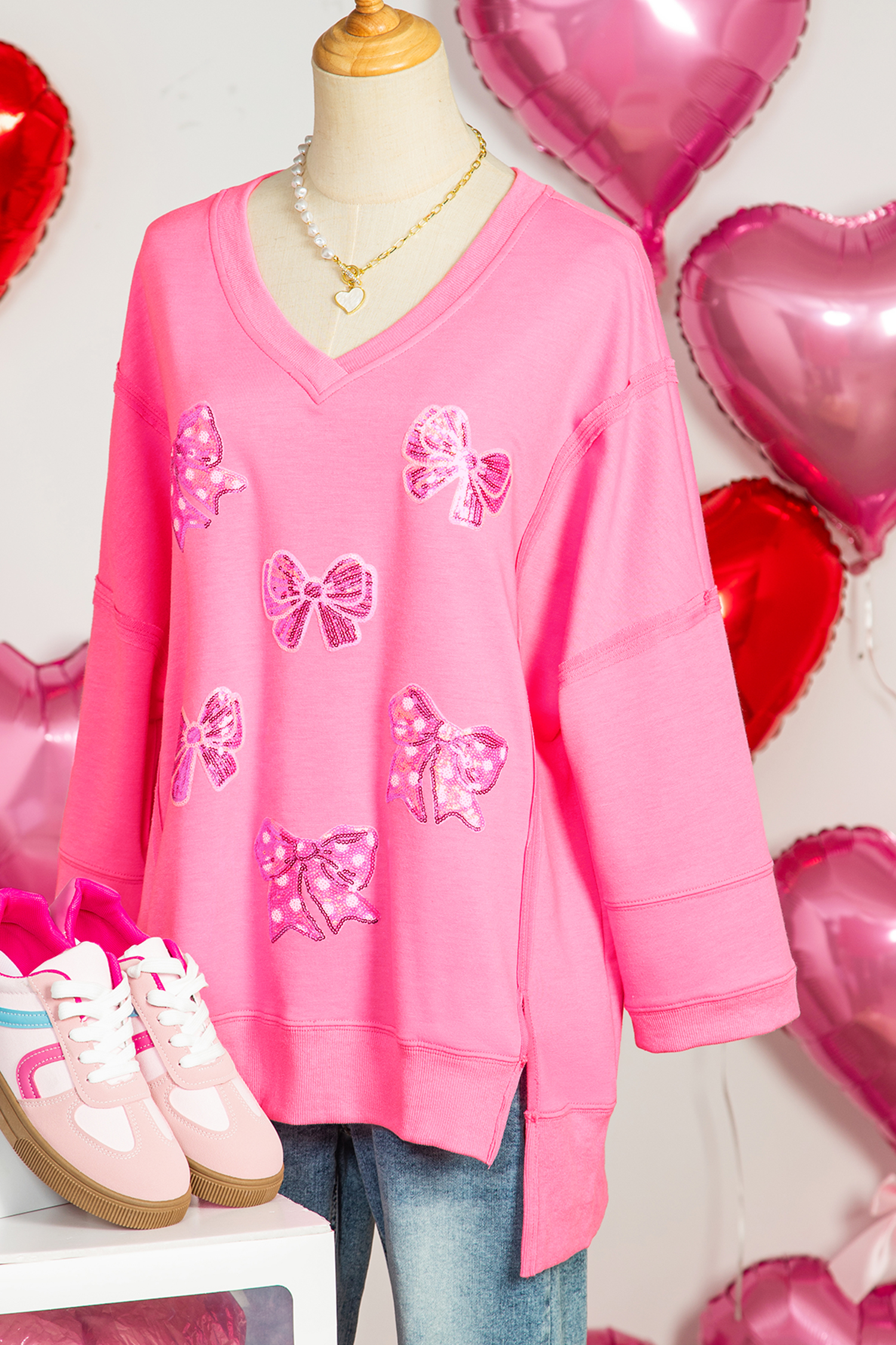 Bonbon Sequined Bow Patched Exposed Seam Bracelet Sleeve High Low T Shirt