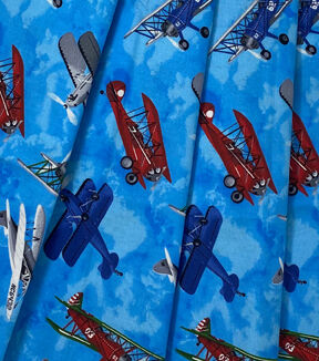 Fabric Traditions Tossed Airplanes Novelty Cotton Fabric