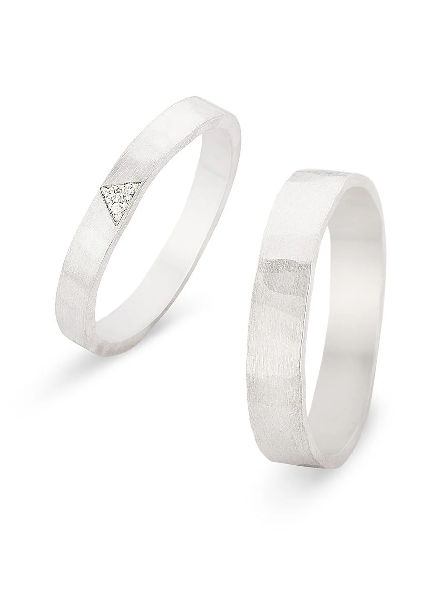 Trouwringen in 18k wit goud met diamant: Yoko en John