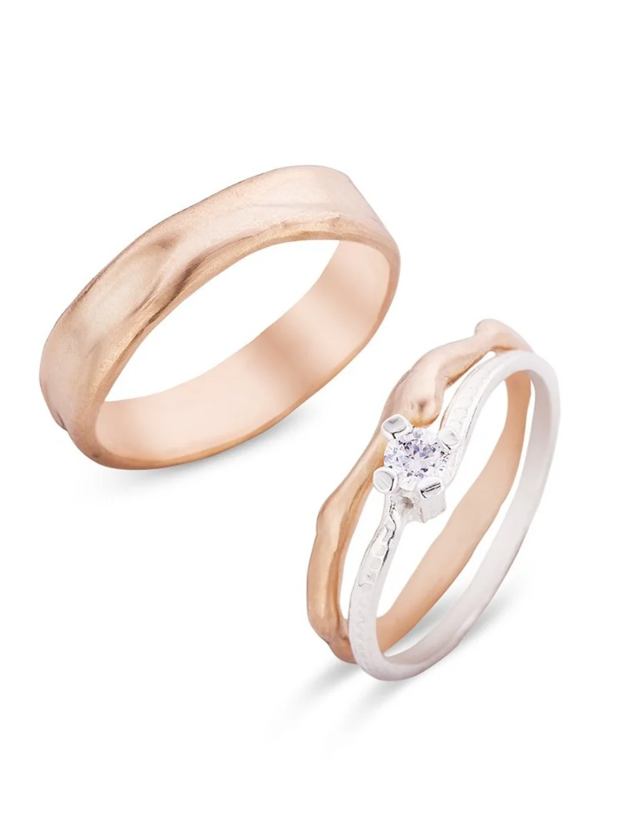 Trouwringen in 18k rosé goud en wit goud met diamant: Charles, Diana en Camilla