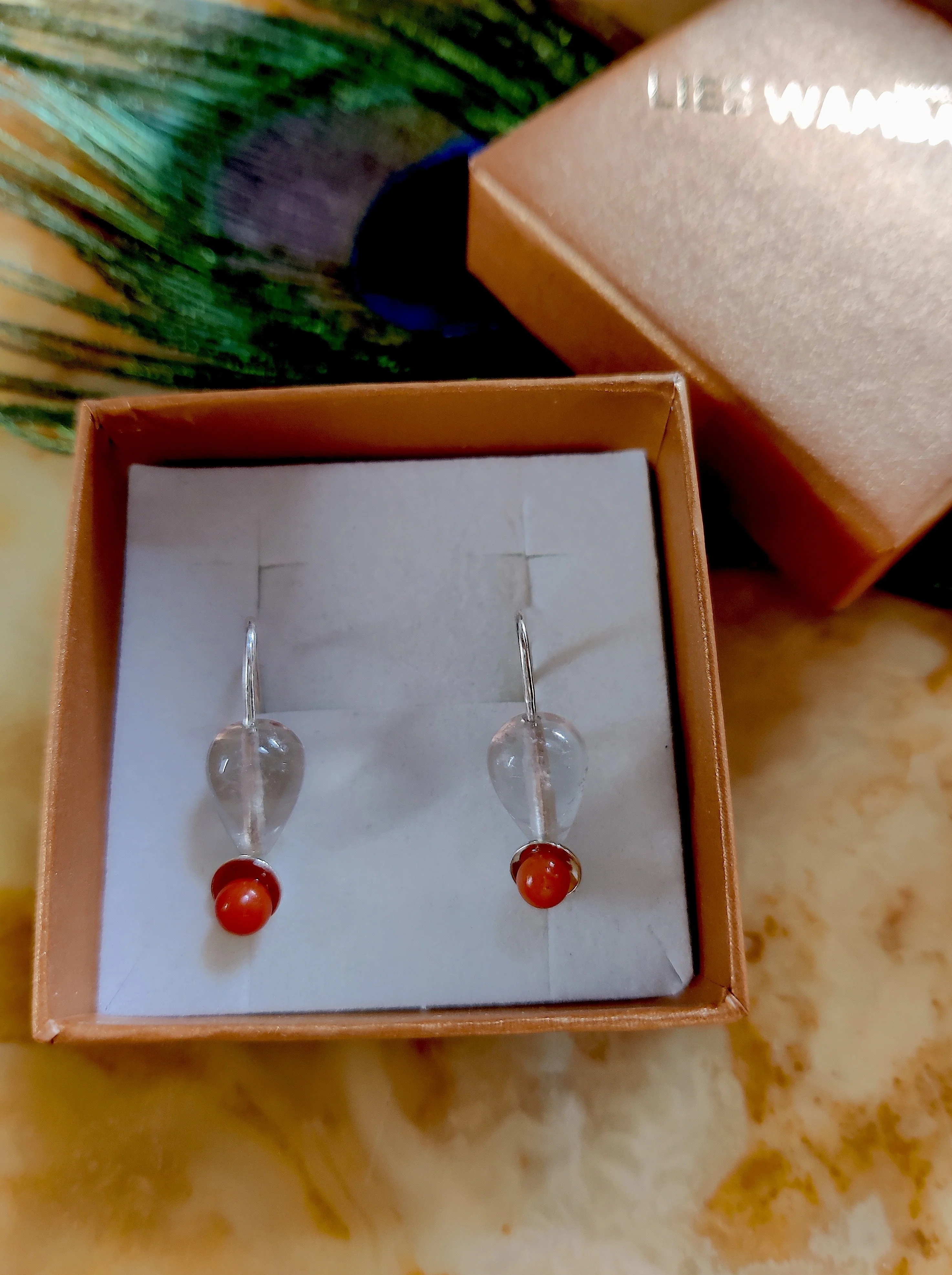 Oorbel in zilver met rozenkwarts en koraal: Juniper.