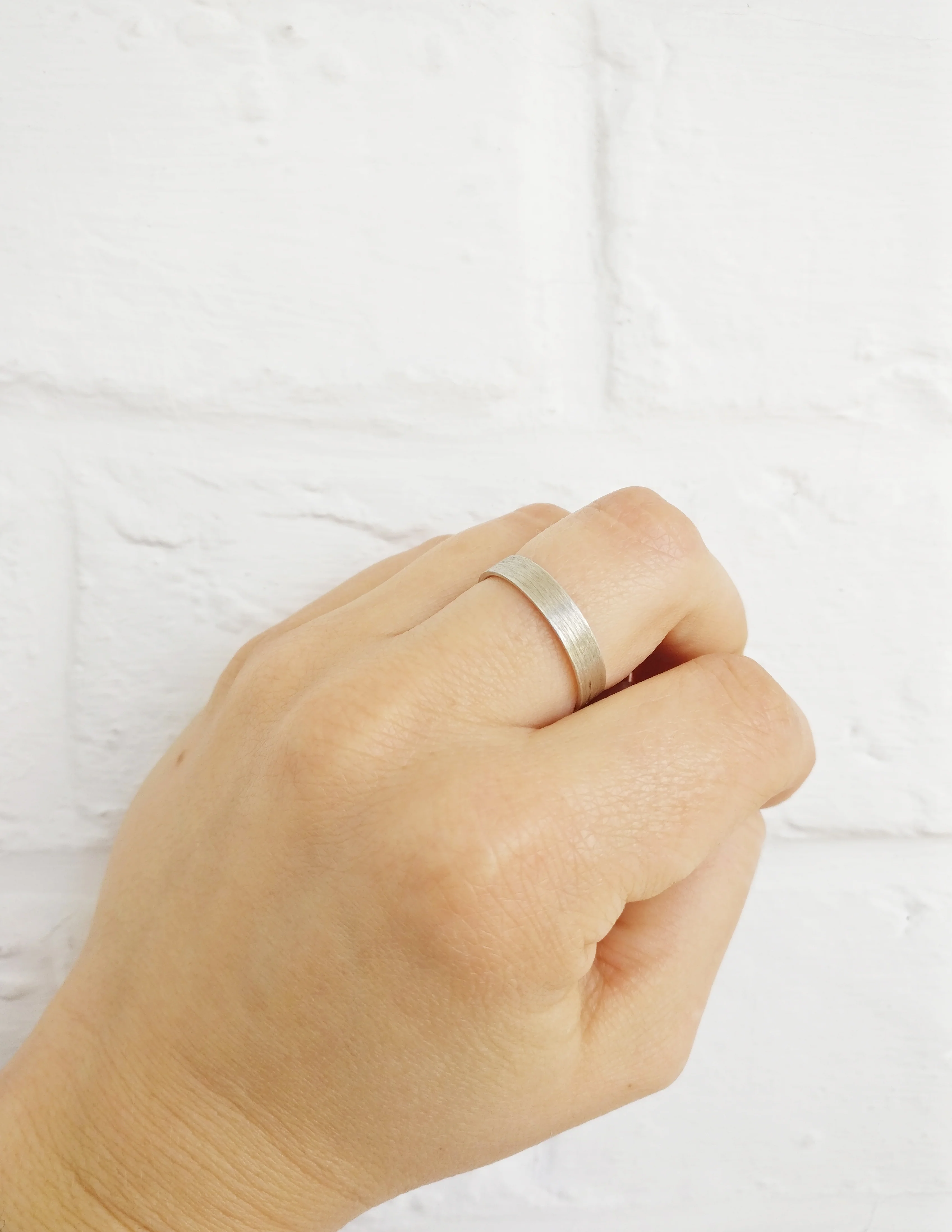 Trouwringen in 18k wit goud met diamant: Serge en Jane