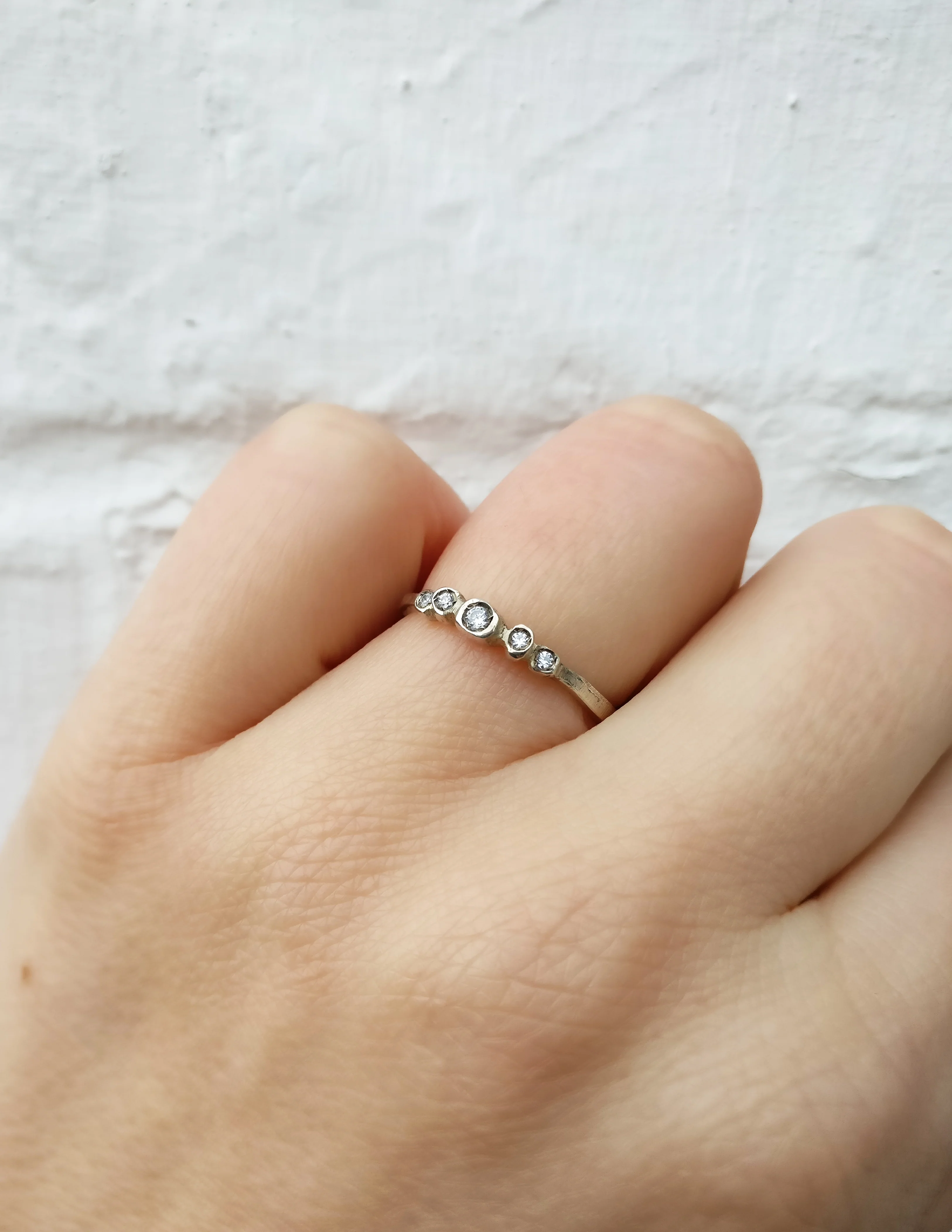 Trouwringen in 18k wit goud met diamant: Albert en Victoria