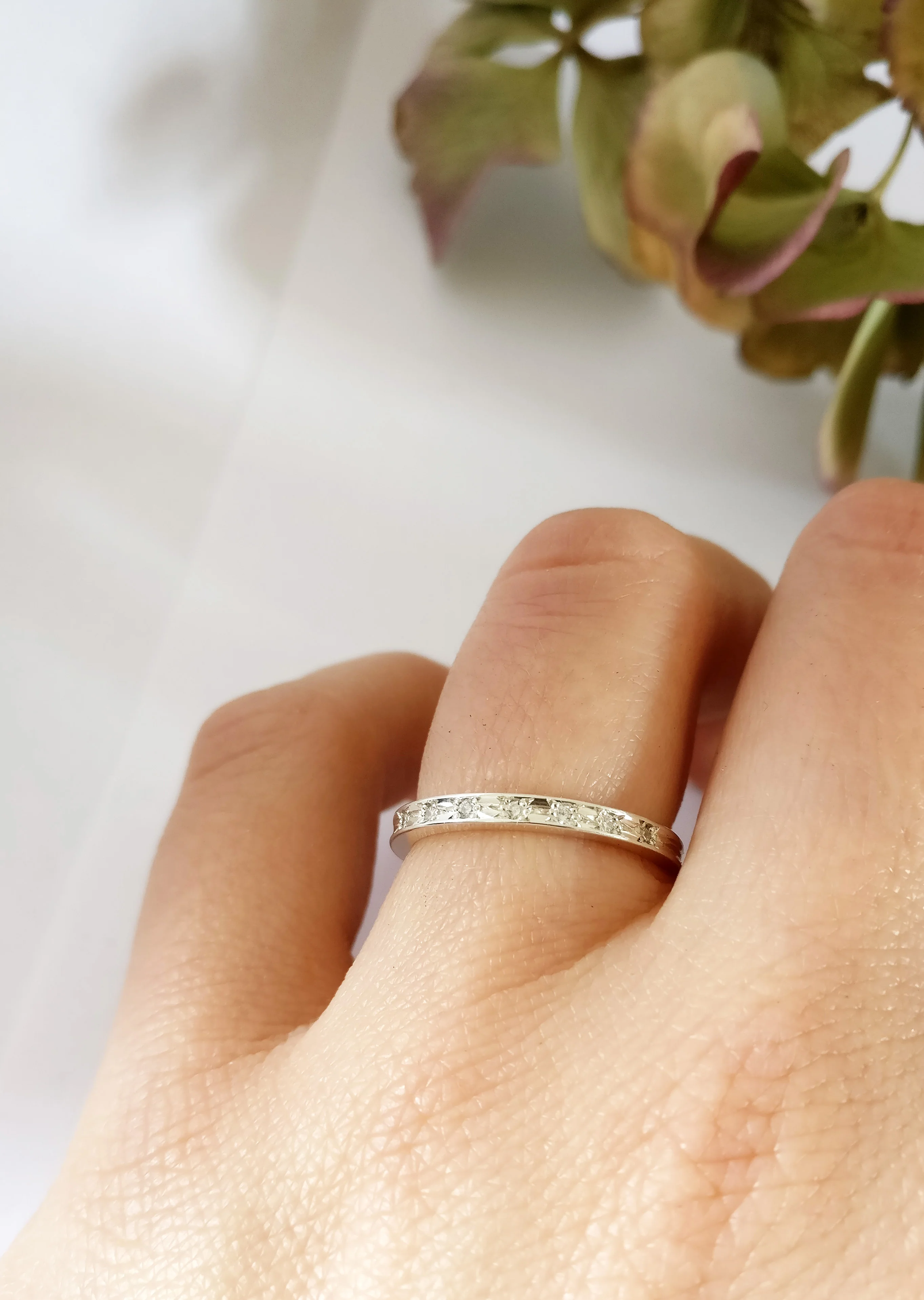 Trouwringen in 18k wit goud met diamant: Meg en Jack