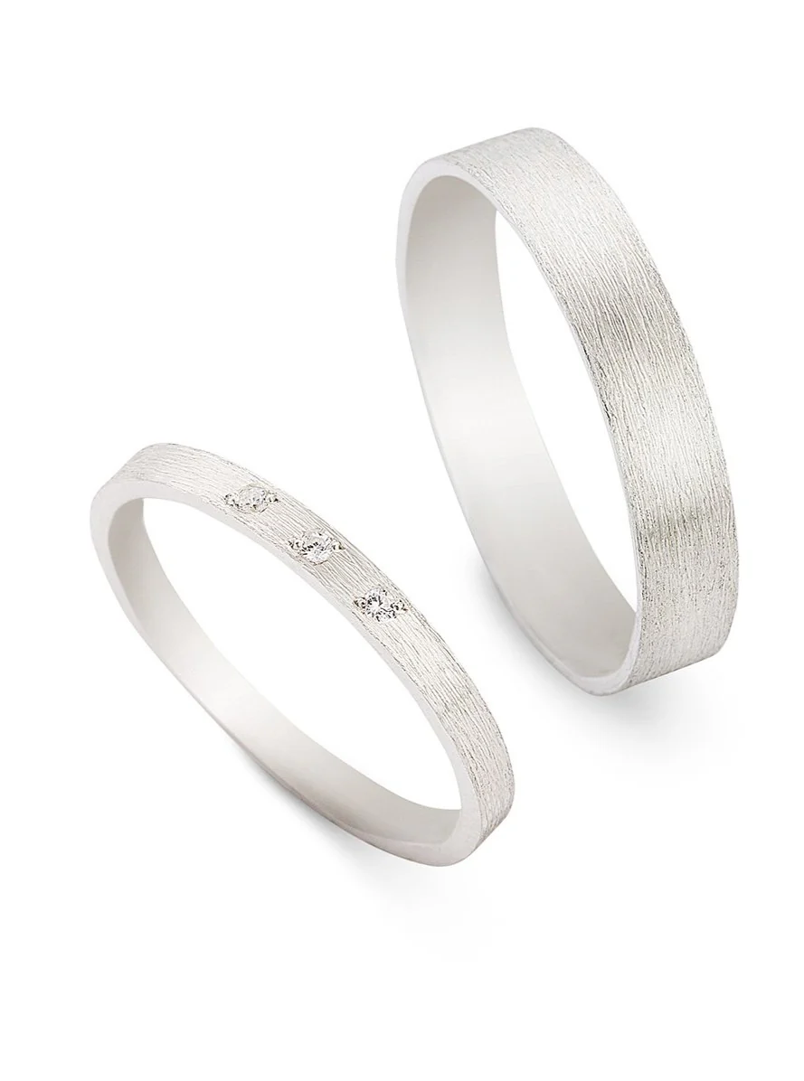 Trouwringen in 18k wit goud met diamant: Serge en Jane