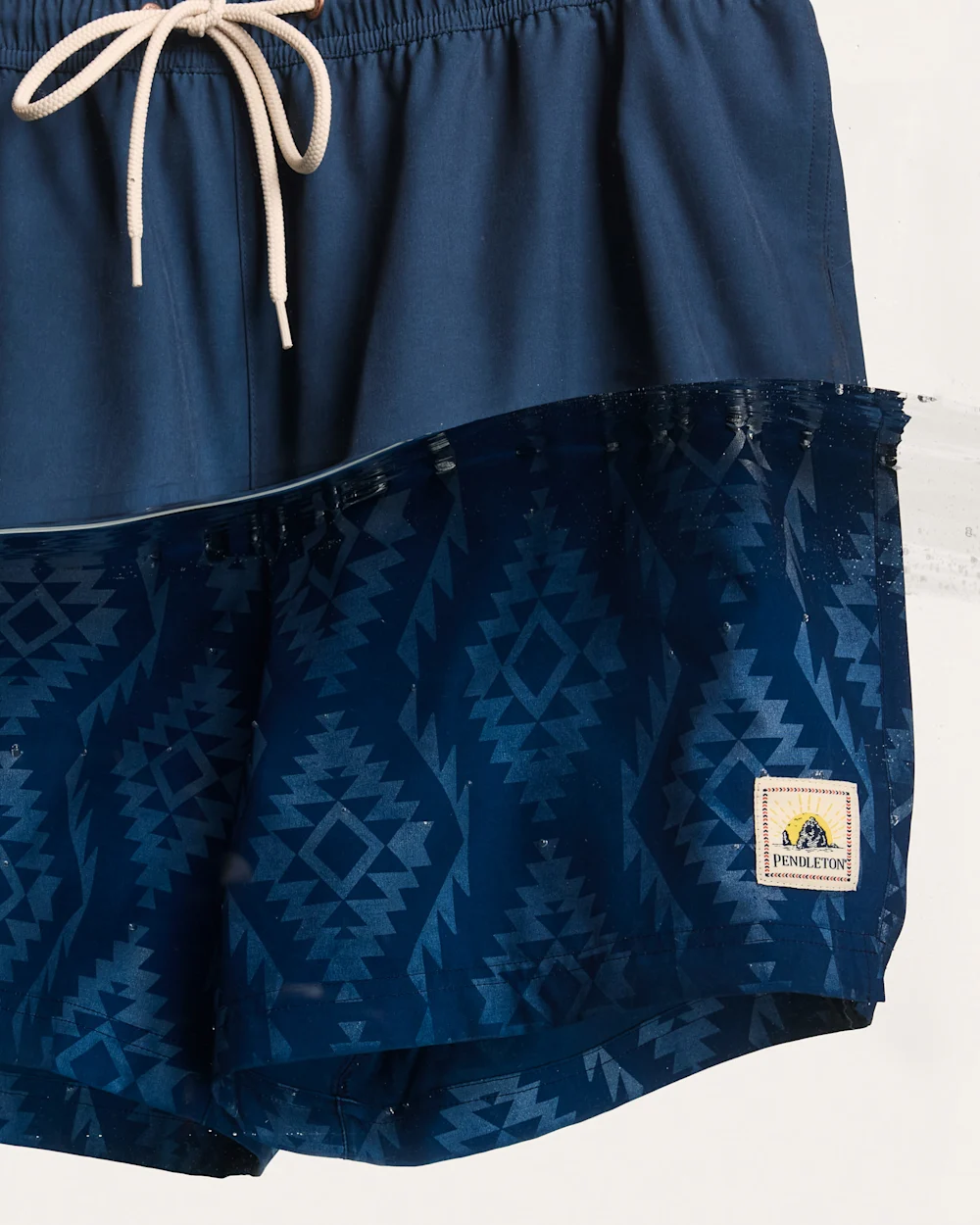 BANDED CROWN HYDROMORPH SWIM TRUNKS