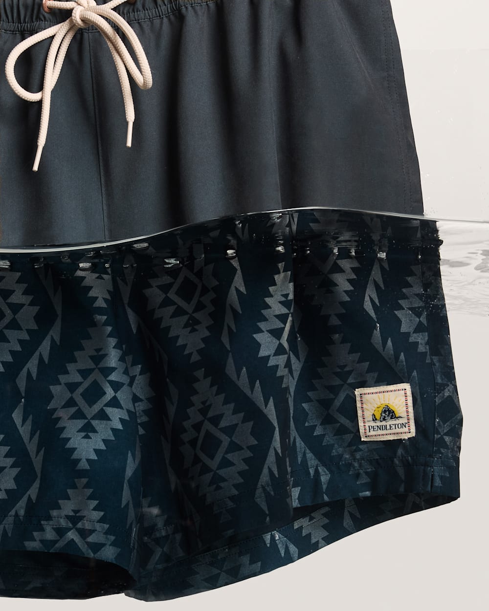 BANDED CROWN HYDROMORPH SWIM TRUNKS