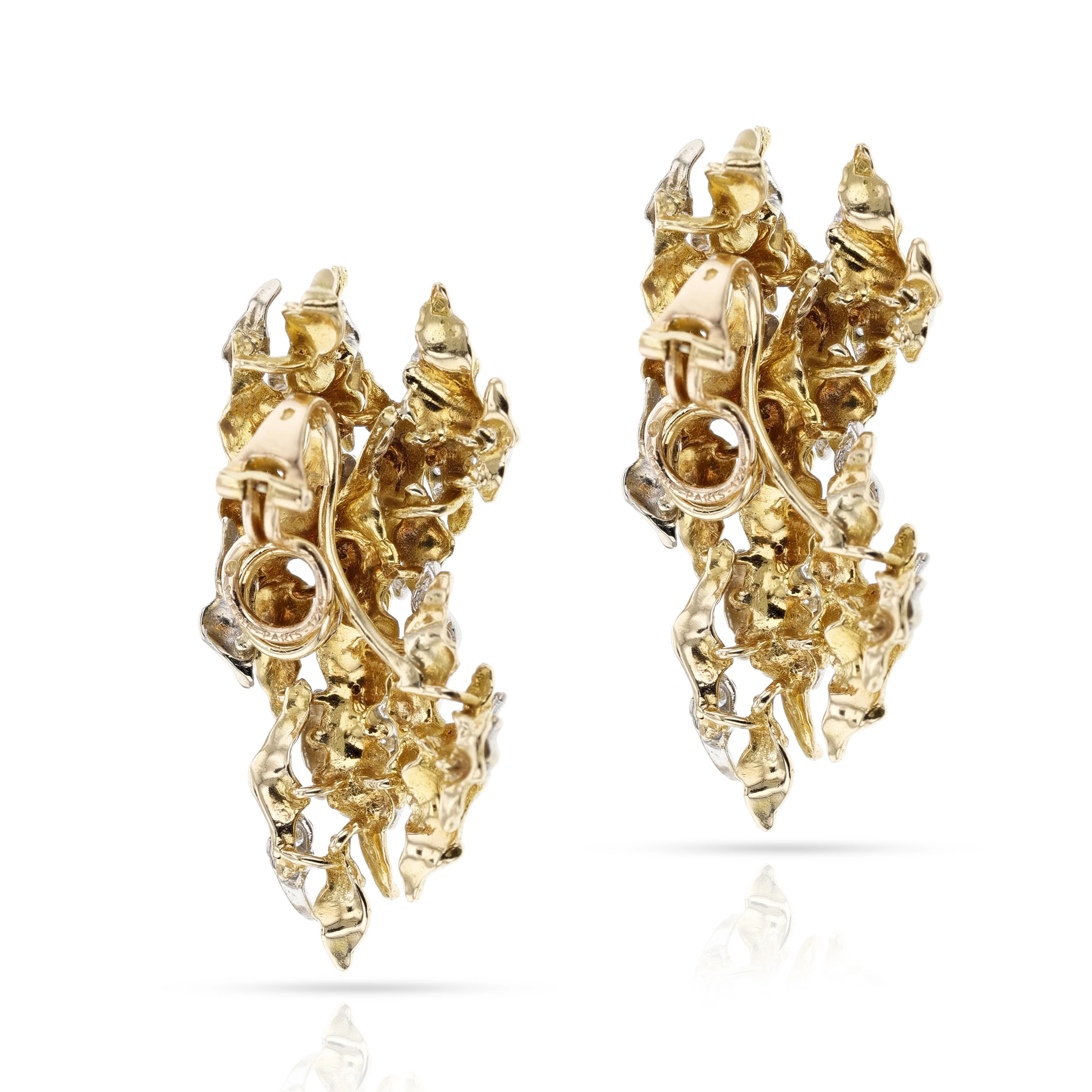 1970s Sterlé Yellow and White Gold Wavy Earrings with Diamonds