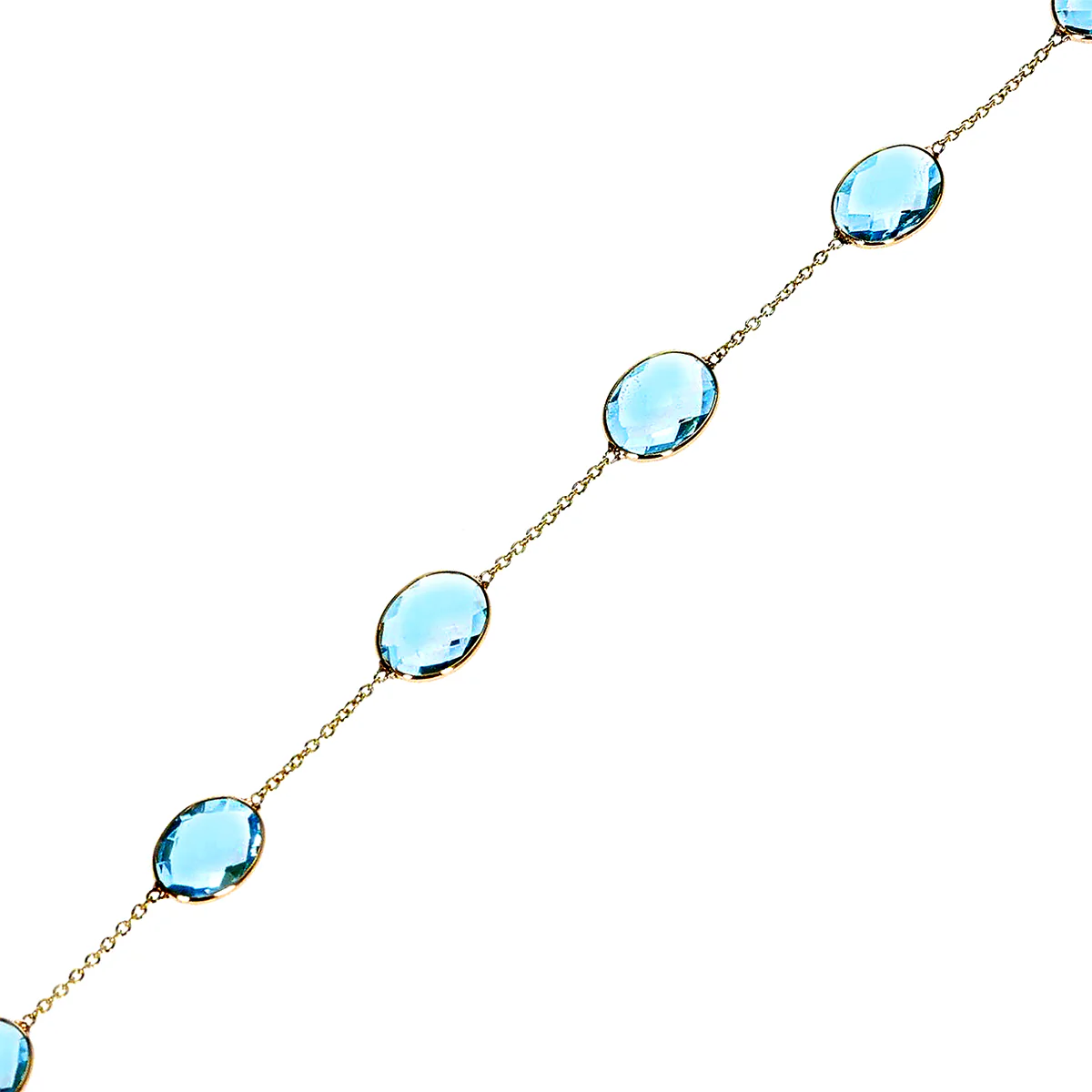 Oval Faceted Blue Topaz Adjustable Bracelet, 18k Yellow Gold