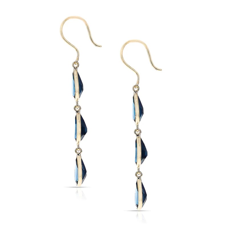 Pear Shape Blue Topaz Dangling Earrings made in 18 Karat Yellow Gold.