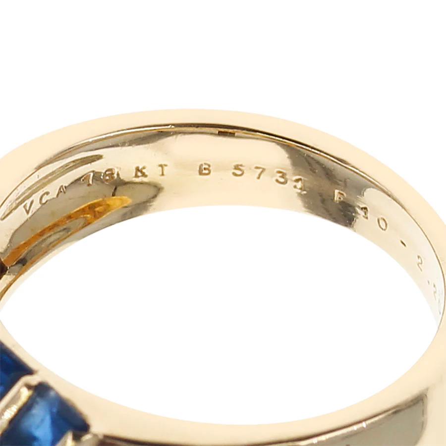 Van Cleef & Arpels Invisibly-Set Nine Sapphire and Diamonds Ring, 18K Yellow