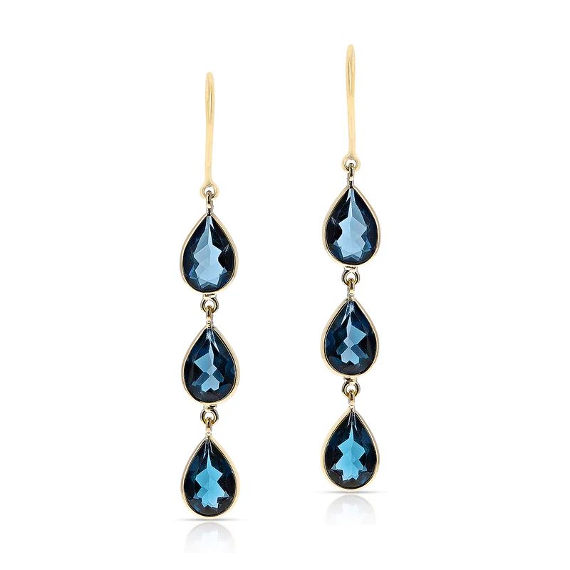 Pear Shape Blue Topaz Dangling Earrings made in 18 Karat Yellow Gold.