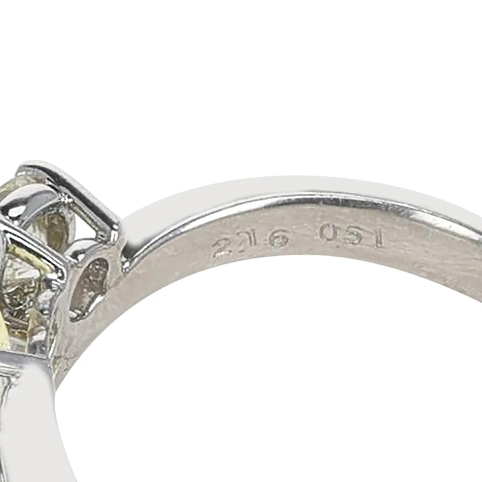 2.16 carat Heart-Shape Yellow Sapphire with 0.51 ct. Two Round Diamonds, Platinum