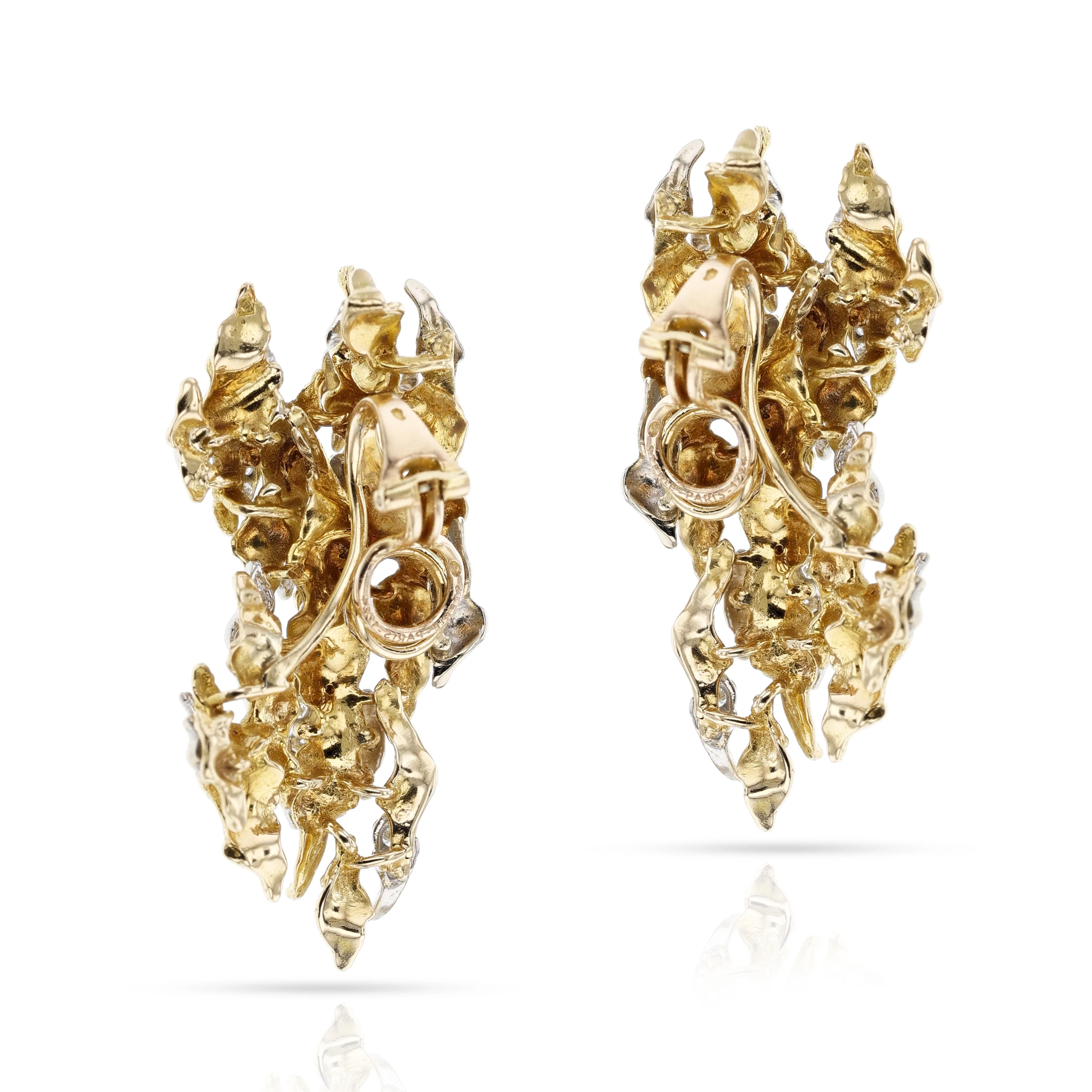 1970s Sterlé Yellow and White Gold Wavy Earrings with Diamonds