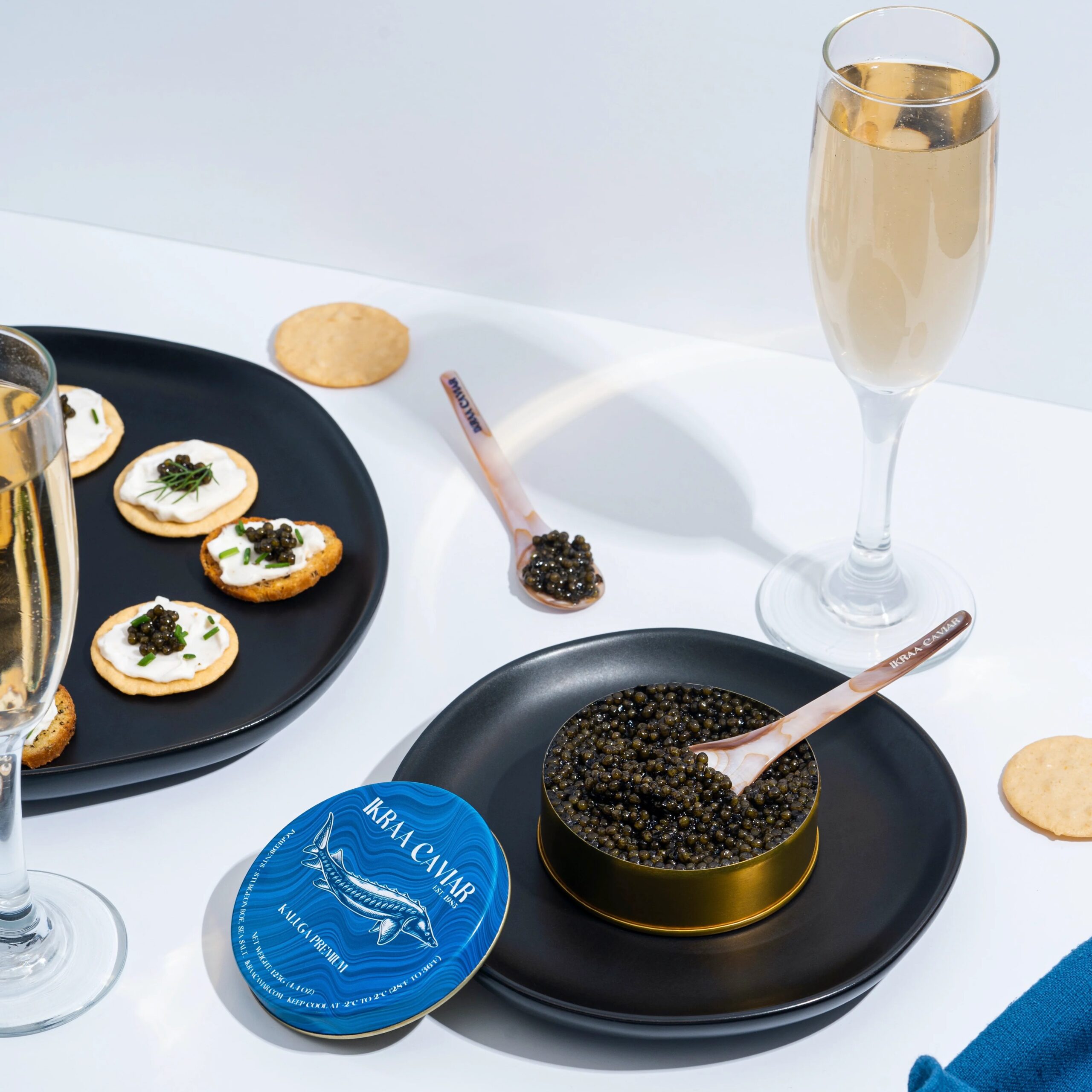 IKRAA Caviar Picnic Pack for Four – 8oz with Blinis, Truffle Butter, Crème Fraîche & Pearl Spoons