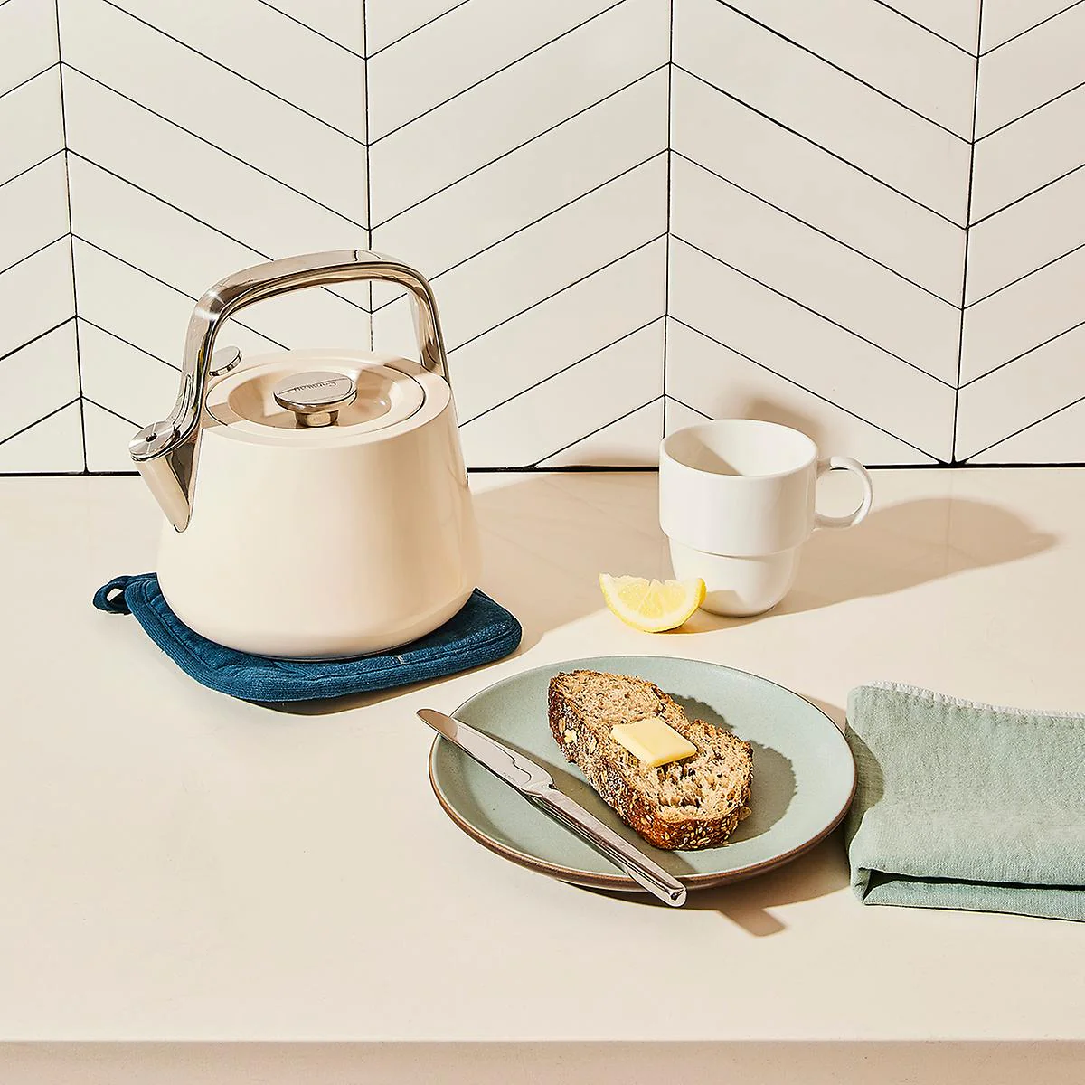 Caraway Whistling Tea Kettle in Cream