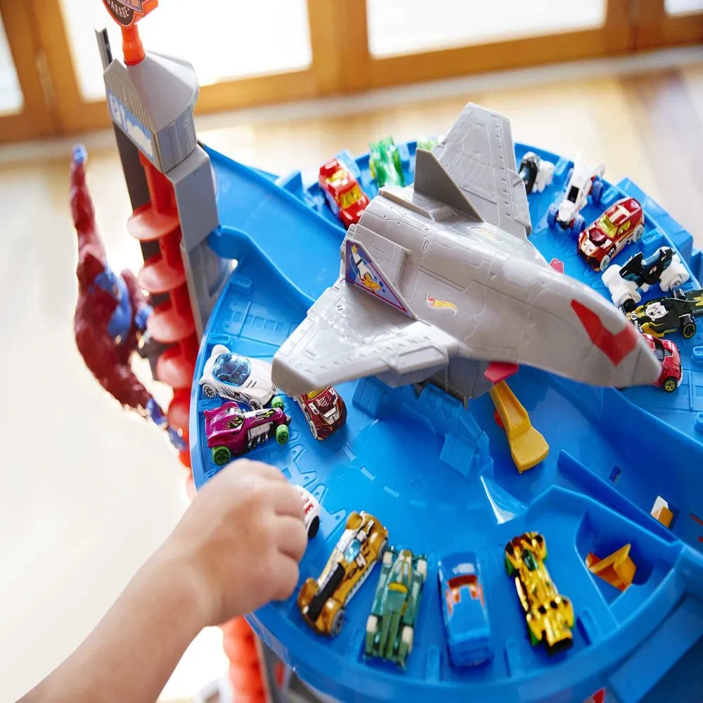 Hot Wheels Track Set with 4 1:64 Scale Toy Cars, Super Ultimate Garage, Over 3-Feet Tall