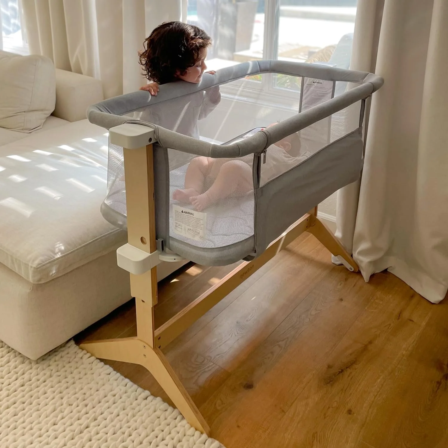 Newton Baby Bassinet & Bedside Sleeper with Mattress & Sheet - 100% Breathable & Washable, Removable Dual-Layer Cover | Solid Birch Frame Adjustable Height & Infant Access Opening