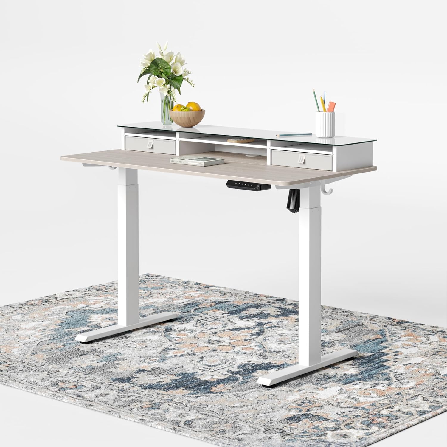 FEZIBO Electric Standing Desk with Double Drawers, 48 x 24 Inch Glass Top Monitor Stand Adjustable Sit Stand Desk with Storage Shelf, White Frame/LightWalnut Top