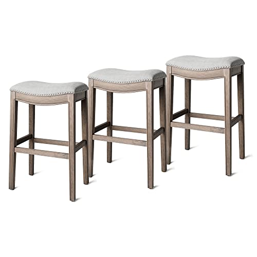 Maven Lane Adrien 31 Inch Bar Height Upholstered Backless Saddle Barstool in White Oak Finish with Natural Color Fabric Cushion Seat, Set of 3