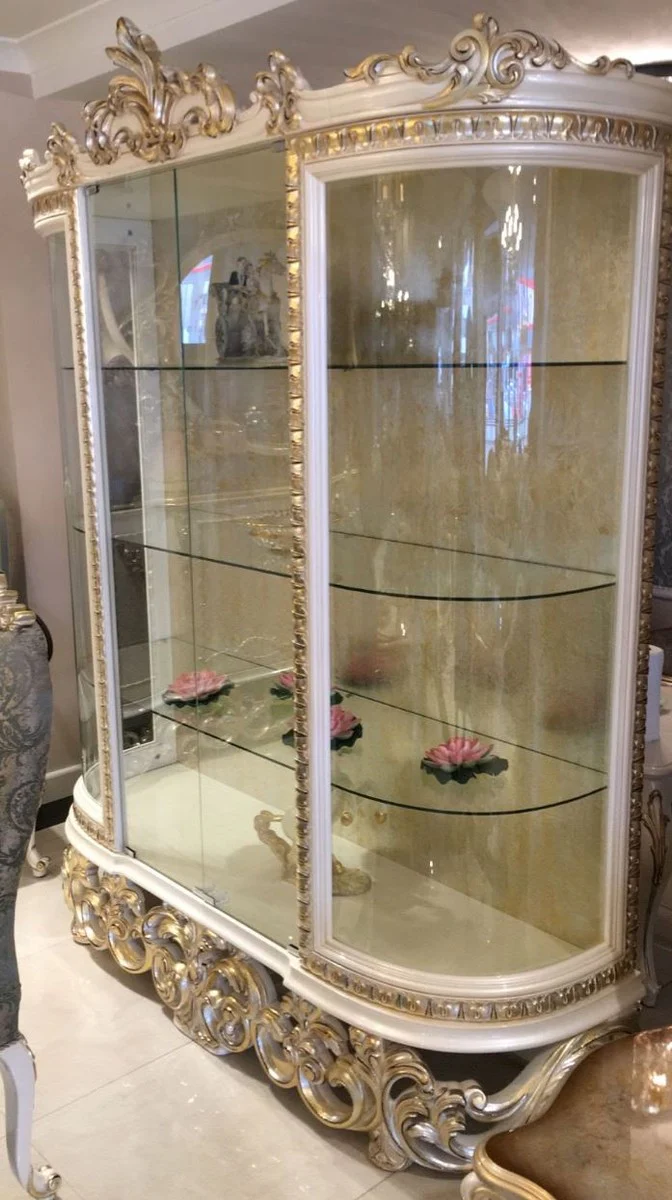 Luxus Barock Vitrine Weiß / Silber / Gold 170 x 50 x H. 215 cm - Prunkvoller Vitrinenschrank mit 2 Glastüren und 3 Glasregalen - Barock Möbel