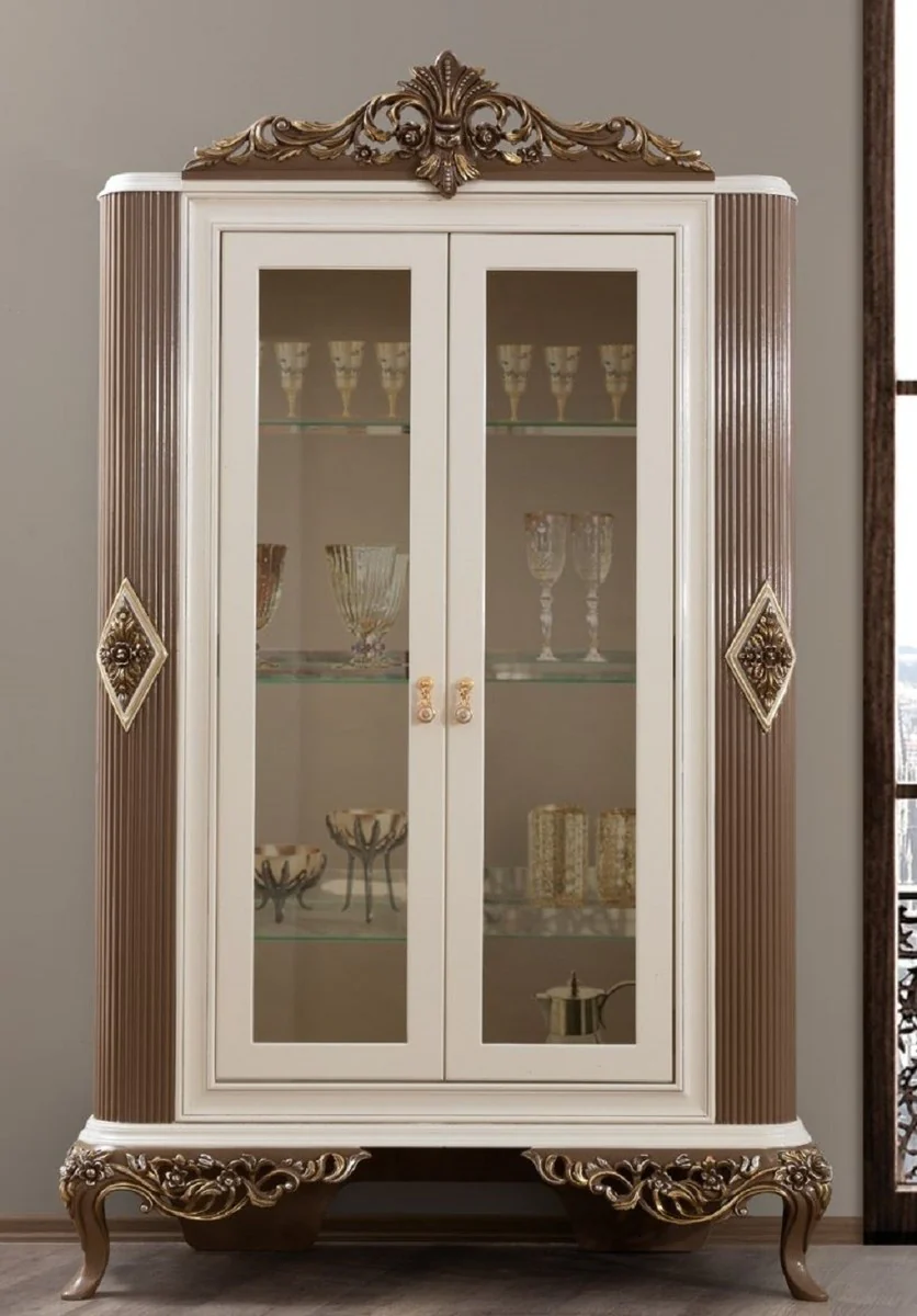 Luxus Barock Wohnzimmer Vitrine Weiß / Braun / Gold 130 x 50 x H. 220 cm - Prunkvoller Barock Vitrinenschrank mit 2 Glastüren - Edle Barock Möbel
