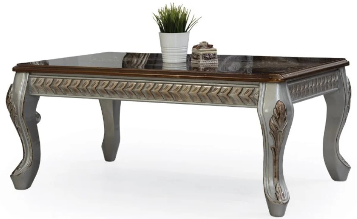 Luxus Barock Couchtisch Braun / Silber / Bronze 115 x 77 x H. 48 cm - Massivholz Wohnzimmertisch - Wohnzimmer Möbel im Barockstil