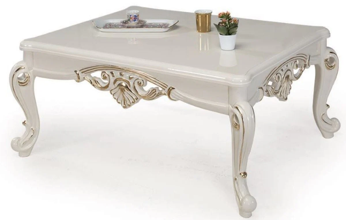 Luxus Barock Couchtisch Weiß / Gold 115 x 85 x H. 50 cm - Massivholz Wohnzimmertisch im Barockstil - Barock Möbel