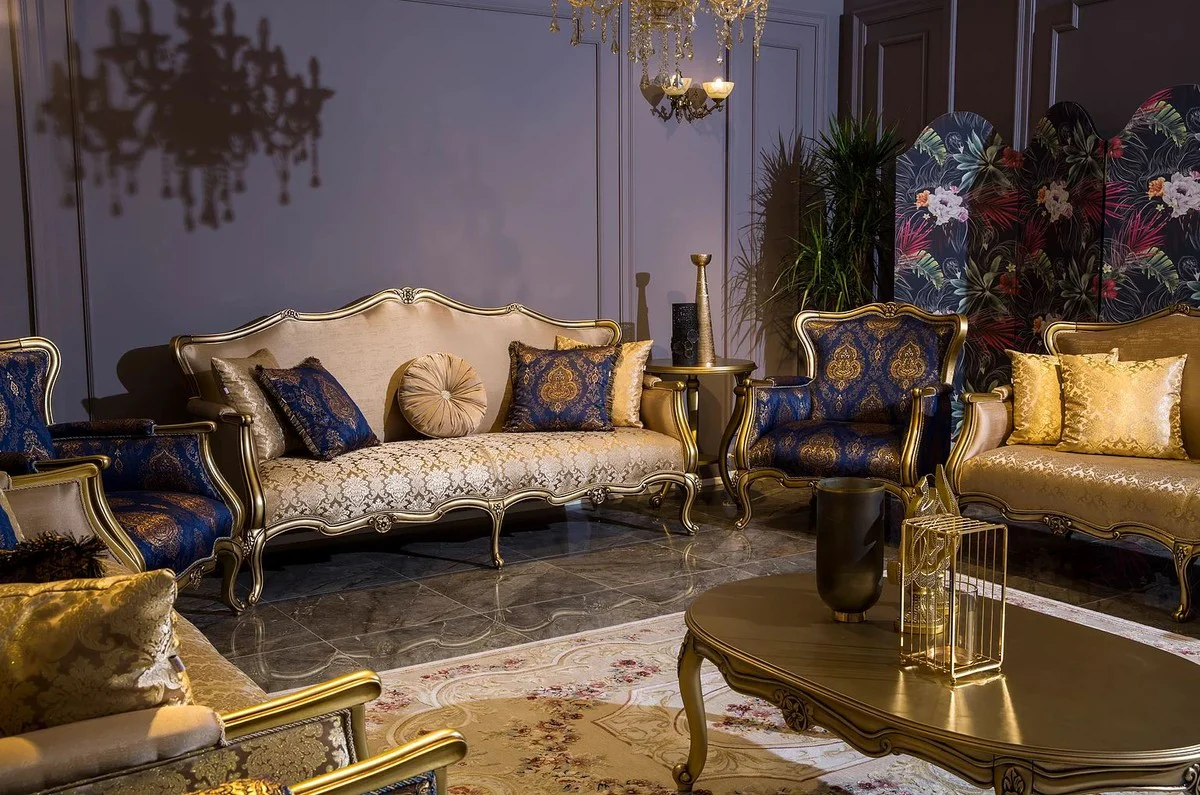 Luxus Barock Couchtisch Gold 129 x 81 x H. 45 cm - Ovaler Massivholz Wohnzimmertisch - Barockstil Möbel