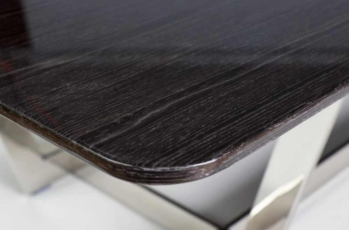 Luxus Couchtisch Schwarz / Silber 140 x 80 x H. 40 cm - Wohnzimmertisch mit Furnierholz Tischplatte und verchromtem Edelstahl Gestell - Wohnzimmer Möbel