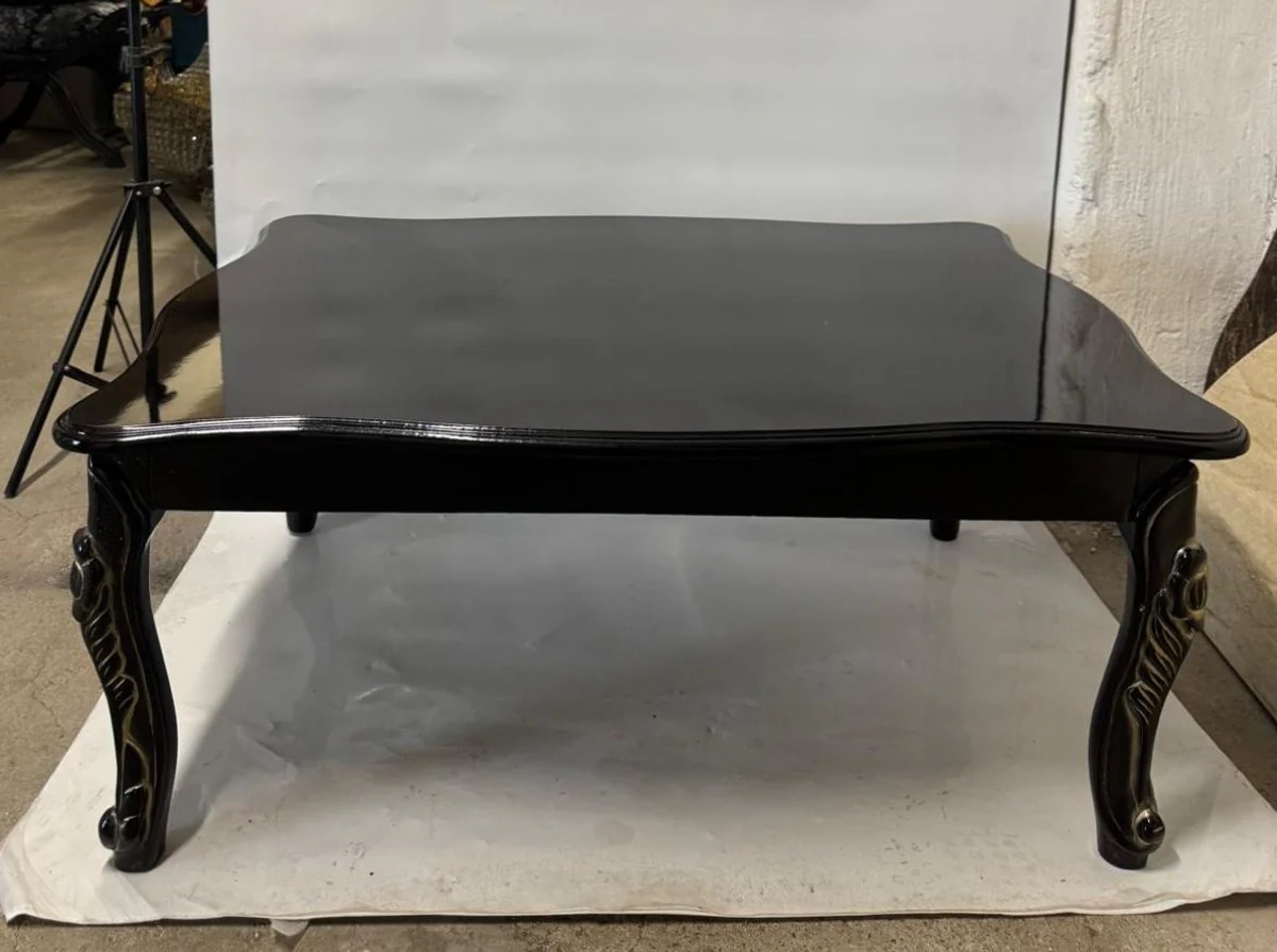 Luxus Barock Couchtisch Schwarz / Gold 105 cm - Barockstil Wohnzimmertisch