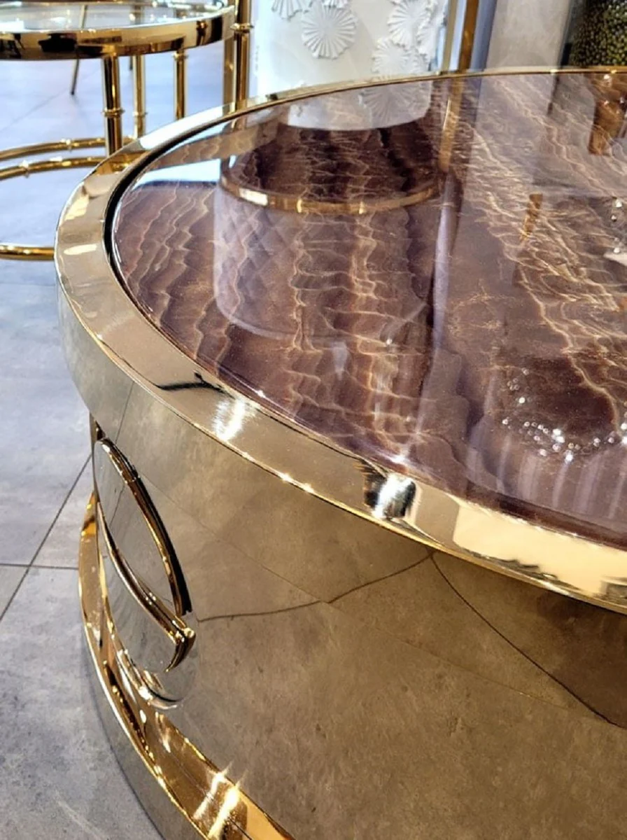 Luxus Couchtisch Gold / Braun Ø 95 x H. 32 cm - Runder Wohnzimmertisch mit Kunstmarmor Tischplatte - Wohnzimmer Möbel - Hotel Möbel - Luxus Möbel