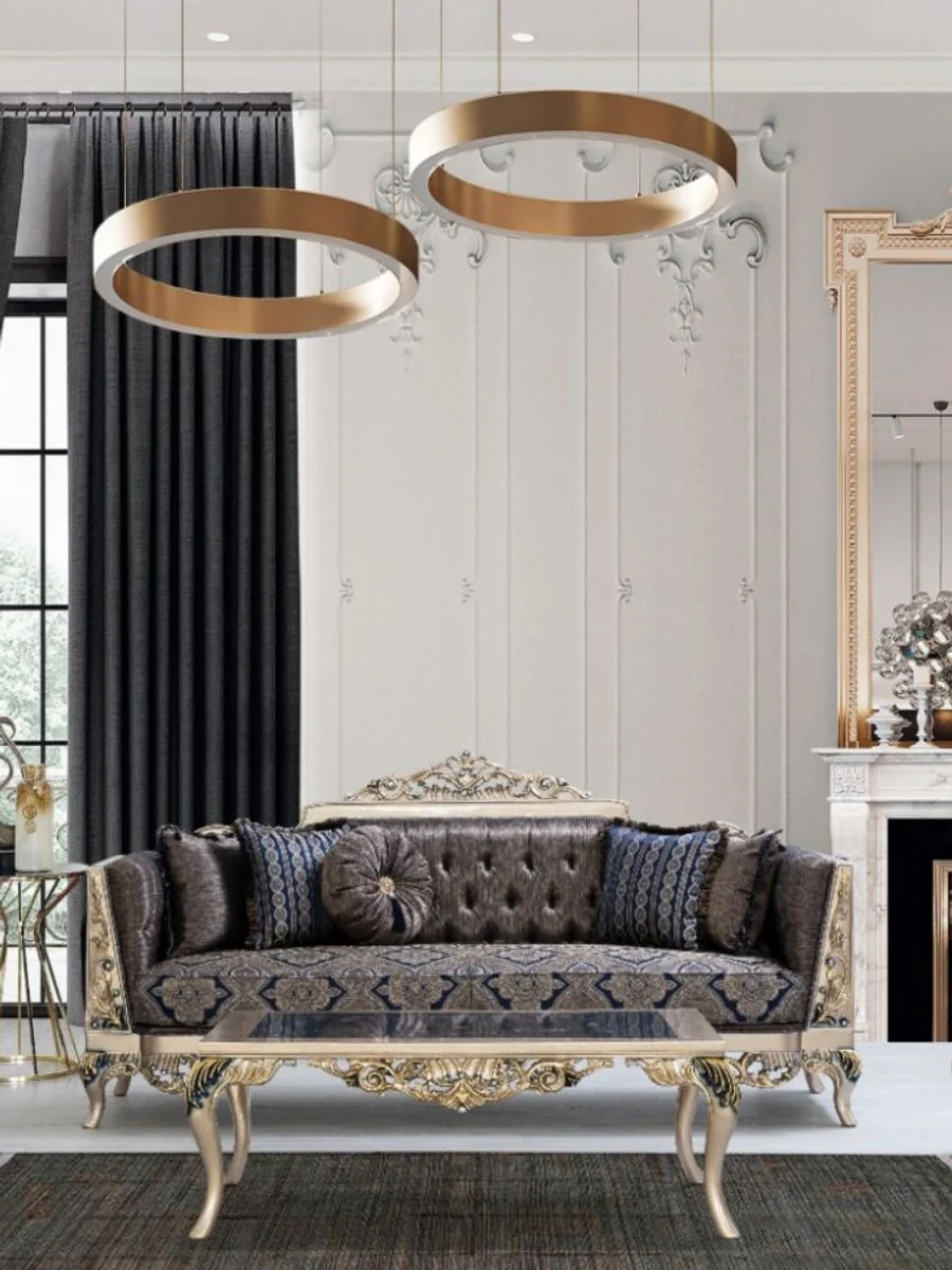 Luxus Barock Couchtisch mit Glasplatte Silber / Schwarz / Gold 128 x 95 x H. 46 cm - Prunkvoller Wohnzimmertisch mit elegantem Muster - Wohnzimmer Möbel im Barockstil