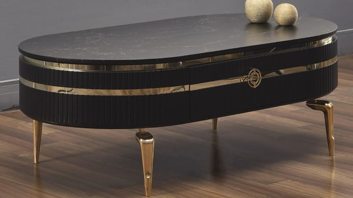 Luxus Art Deco Couchtisch Schwarz / Gold 120 x 67 x H. 42 cm - Ovaler Wohnzimmertisch mit Schublade und Kunstmarmor Tischplatte - Wohnzimmer Möbel - Art Deco Möbel - Luxus Möbel