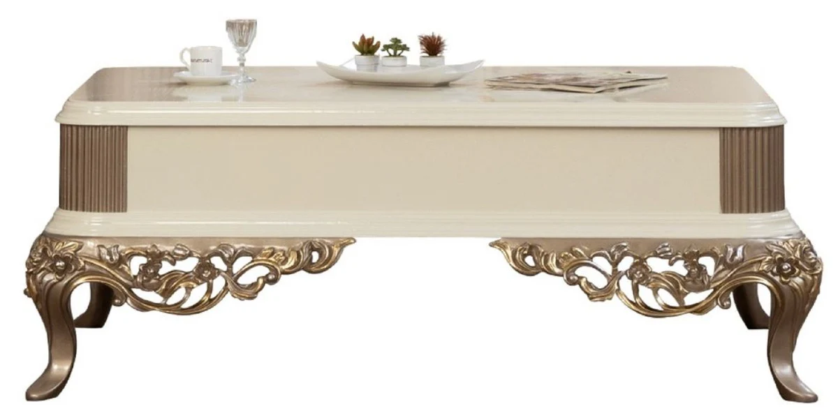Luxus Barock Couchtisch Weiß / Braun / Gold 130 x 92 x H. 50 cm - Prunkvoller handgefertigter Wohnzimmertisch im Barockstil - Barock Möbel