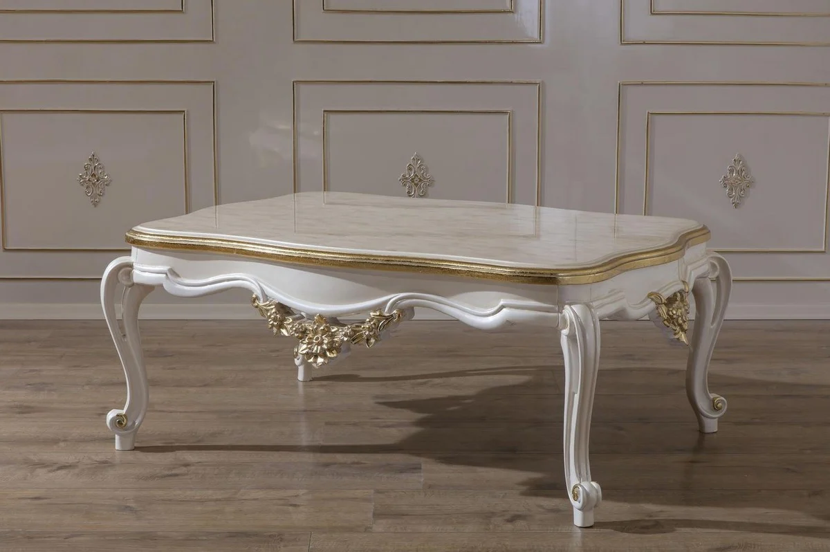 Luxus Barock Couchtisch Weiß / Gold 130 x 90 x H. 47 cm - Prunkvoller Massivholz Wohnzimmertisch im Barockstil - Barock Möbel
