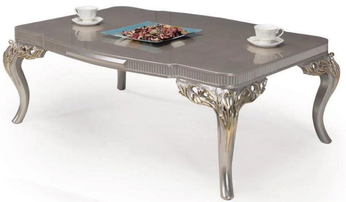 Luxus Barock Couchtisch Silber / Gold 120 x 86 x H. 45 cm - Prunkvoller Wohnzimmertisch im Barockstil - Barockmöbel