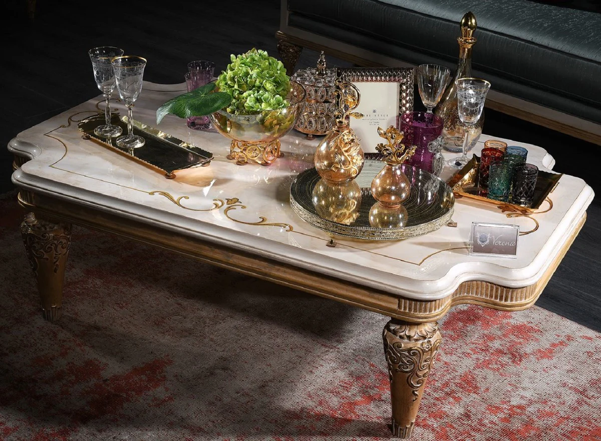 Luxus Barock Wohnzimmertisch Weiß / Gold 140 x 90 x H. 42 cm - Barock Couchtisch