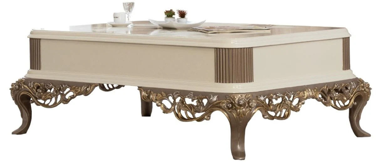 Luxus Barock Couchtisch Weiß / Braun / Gold 130 x 92 x H. 50 cm - Prunkvoller handgefertigter Wohnzimmertisch im Barockstil - Barock Möbel