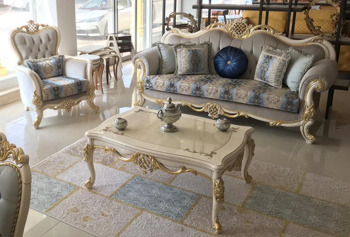 Luxus Barock Couchtisch Weiß / Gold 118 x 87 x H. 50 cm - Massivholz Wohnzimmertisch - Möbel im Barockstil