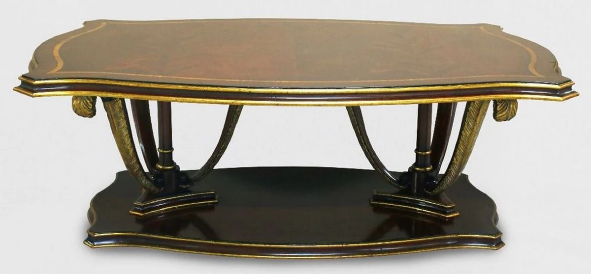Luxus Barock Couchtisch Braun / Gold 130 x 90 x H. 44 cm - Mahagoni Wohnzimmertisch mit dekorativen handgeschnitzten Federn - Edle Barockstil Wohnzimmer Möbel